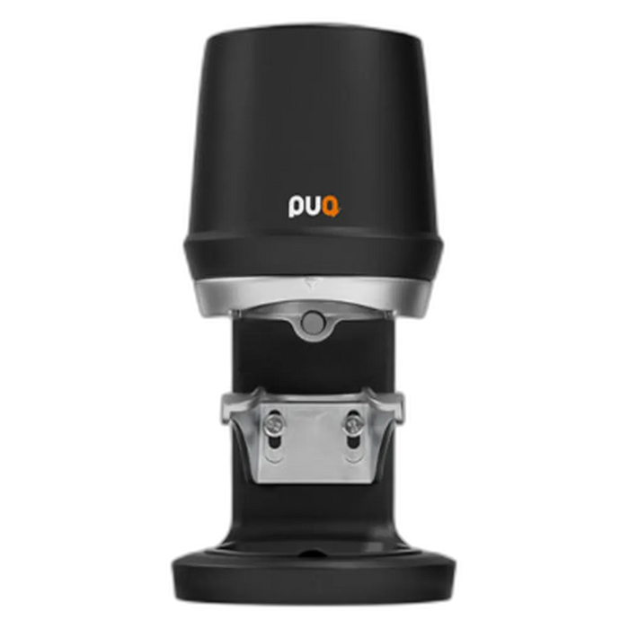Zwarte PuqPress Q1 automatische koffie stamper met zilveren details
