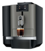 JURA X4c Dark Inox koffiemachine met touchscreen en vers gezette espresso in glazen kopje