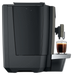 JURA X4c Dark Inox koffiemachine met vaste wateraansluiting en zwarte koffie in glas